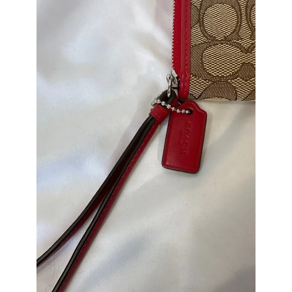 Coach Signature Canvas wristlet Wallet with Red Trim